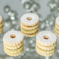 Chic Alfajores - 8 Ct. · These incredible soft cookies filled with dulce de leche are simple a delight.