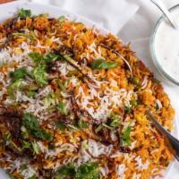 Vegetable Biryani · Fresh vegetables cooked with basmati rice, nuts and spices.