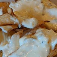 Tdc Bleu Chips · Homemade potato chips topped with our homemade signature bleu cheese.