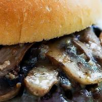 Swiss & Mushroom Burger · Sautéed mushrooms covered with melted swiss cheese. Served with fries.