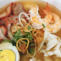 Fusion Noodle · Rice noodle, shrimp, calamari, BBQ pork, boiled egg.