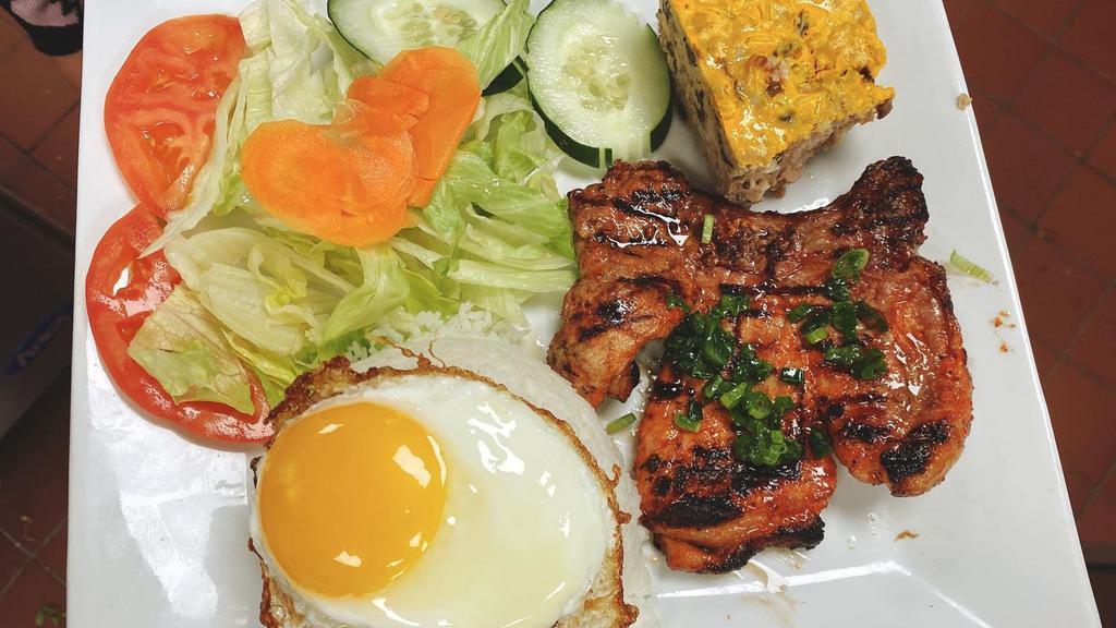 Combo · Pork chop, baked eggs and sunny-side egg.