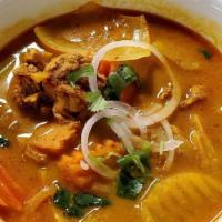 Curry Chicken · Yellow curry topped with chicken, carrot, potato, sweet potato, cilantro, onion and your cho...
