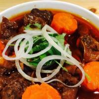 Beef Stew · Beef stew topped with beef cube, potato, carrot, onion and your choice of side dish: steamed...