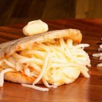 Arepa Con Queso · Arepa stuffed with deliciously creamy and soft melted Mozzarella cheese