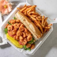 Fried Shrimp · Fried Shrimp on fresh baked French Bread dressed with Lettuce, Tomato and Pickle Spear. Come...
