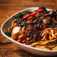 Oxtail Lo Mein · Egg Noodles, Carrots, Chambray Onions, Bell Peppers, Snap Peas