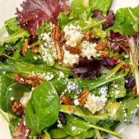 Guantanamera Salad · Mixed field greens and baby spinach, caramelized Charleston pecan halves, diced pears, and g...