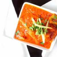 Chicken Tikka Masala · Boneless grilled chicken cooked with tomato, special spices and touch of cream.