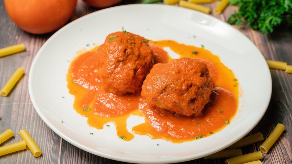 Side Of Meatball'S · Two homemade meatballs in tomato sauce.