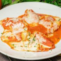 Baked Lasagna · classic Italian dish consisting of the layered pasta sheet, tomato sauce, mozzarella, and gr...