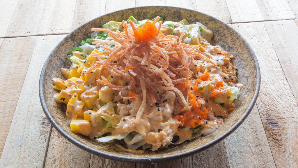 Sushirrito Signature Poke Bowl · Creamy scallop,spicy surimi crab,wakame salad ,avocado,mango,masago,crispy shredded crab ,sriracha mayo and white sauce