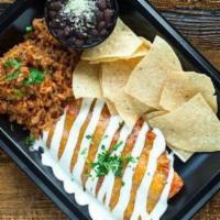 The Whole Enchilada Platter · Two corn tortillas rolled, filled with choice of protein, jack and cheddar cheese, and Toppe...
