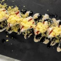 Angel Hair Roll · Shrimp tempura, cream cheese, cucumber with Crabmeat and crunch on top. (yummy sauce, eel sa...
