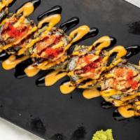 Crazy Roll · Deep fried, spicy crabmeat, asparagus with spicy tuna, crunch on top.