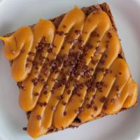 Dulce De Leche Fudge Brownie · Signature Brownie covered with Dulce de Leche Fudge