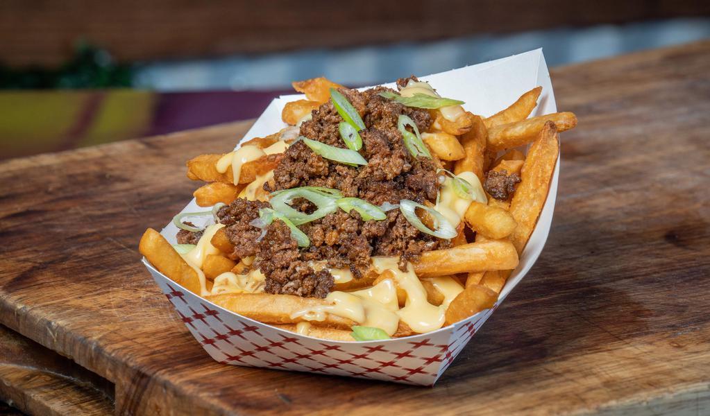 Chorizito Fries · 2 sides of fries combined with creamy nacho cheese and Mexican chorizo