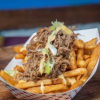 Smoked Fries · 2 sides of fries combined with creamy nacho cheese and Vaca Frita
