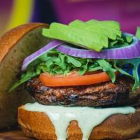  Vegana · Vegan bread, patty vegan (the impossible), tomatoes, lettuce, roasted onion.