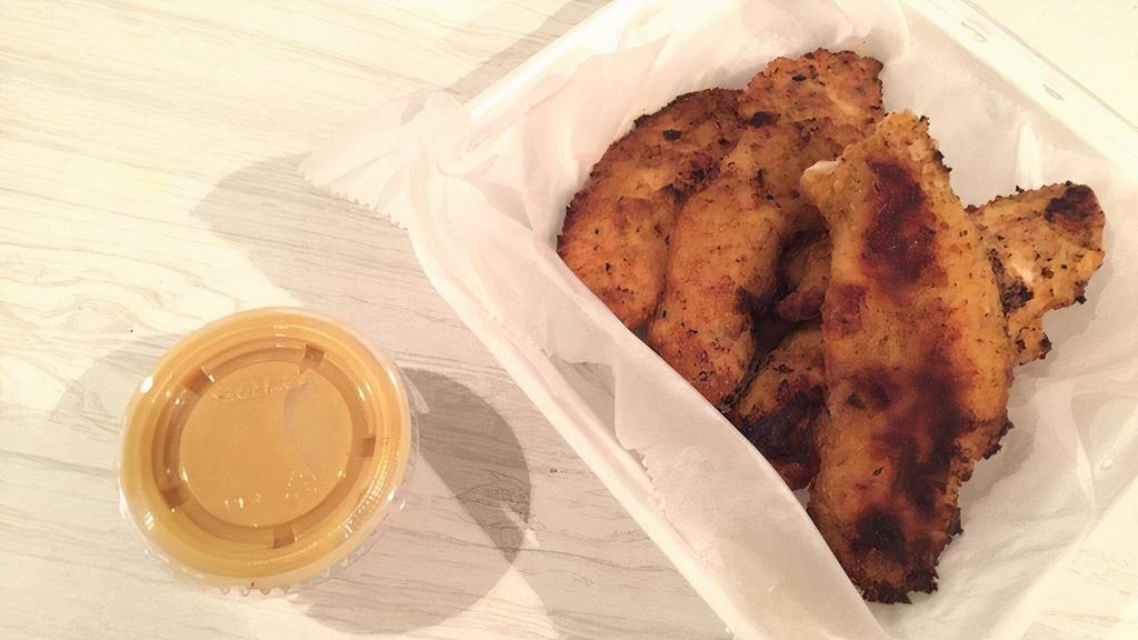 Chicken Tenders · Hand breaded chicken breast. Comes with choice of honey mustard or barbecue dipping.
