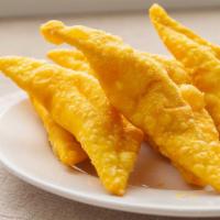 Fried Crab Rangoon  · Fried wonton wrapper filled with crab and cream cheese.
