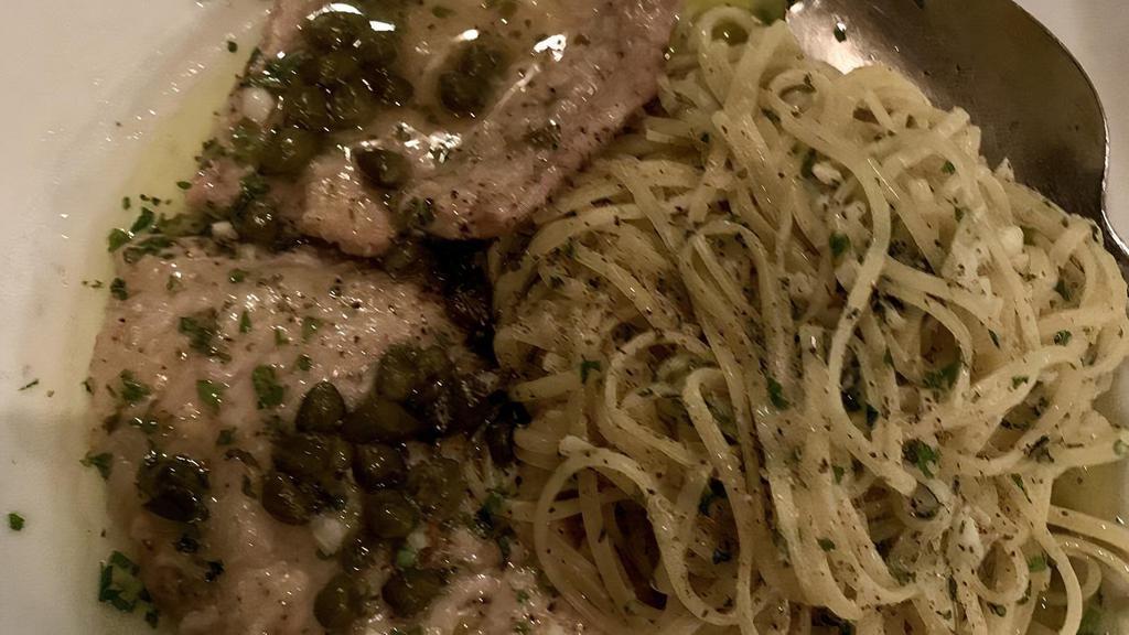 Veal Alla Picatta · Veal scaloppini piccata in a wine and capers sauce served with linguini garlic and oil.