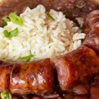Red Beans & Rice · For every day that ends in “y”. Served with smoked sausage and cornbread.