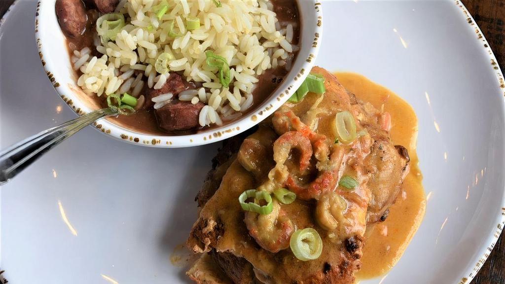 Bayou Chicken · Shrimp and crab-stuffed Creole chicken pan seared and topped with our Crawfish Louie sauce. Choice of side.