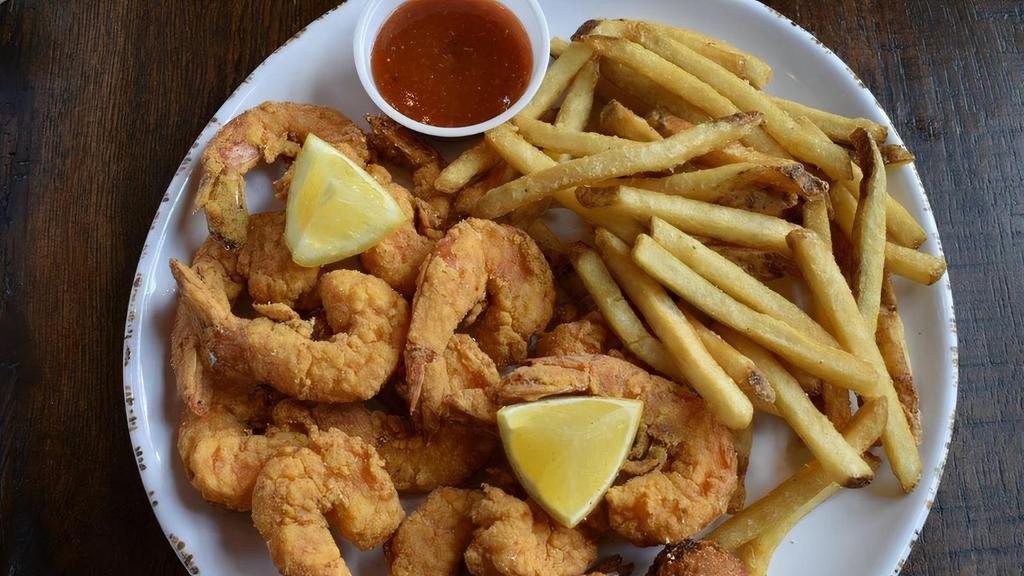 Shrimp Platter · Twelve golden fried shrimp. Served with fries and hushpuppies.