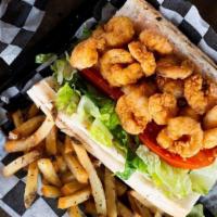 Shrimp Po'Boy · Fried, grilled, or blackened shrimp with remoulade, lettuce, and tomato. Served with fries o...