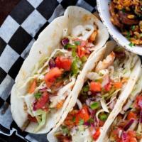Grouper Tacos · Fried, grilled or blackened grouper topped with shredded cabbage, pico de gallo, and tartar ...