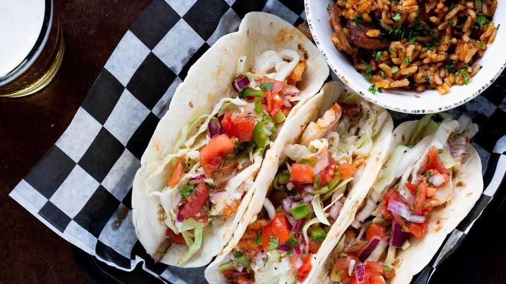 Grouper Tacos · Fried, grilled or blackened grouper topped with shredded cabbage, pico de gallo, and tartar sauce in 3 flour tortillas. Served with fries or Zapp's Voodoo Chips.
