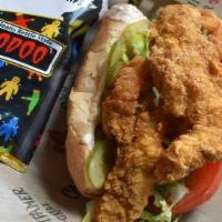 Fried Catfish Po'Boy · Mississippi farm-raised catfish with lettuce, tomato, and tartar sauce. Served with fries or...