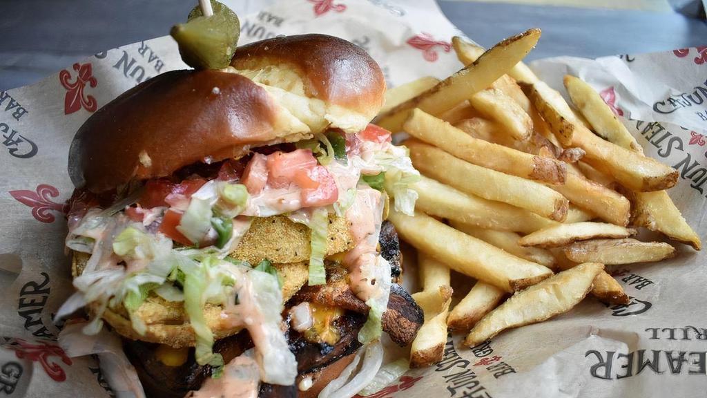 Big Chief’S Fgt Burger · ½ lb brisket burger topped with spicy bacon, fried green tomatoes, cheddar, pickles, lettuce, pico de gallo and remoulade on a brioche bun.