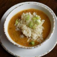 Crawfish Etouffee · Crawfish tails mixed with a golden seasoned roux over white rice.