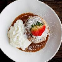 Acadian Bread Pudding · Our homemade recipe (includes pecans) served with bourbon caramel sauce