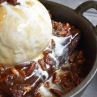 French Quarter Brownie  · Warm chocolate brownie with vanilla. ice cream, bourbon caramel, spicy. pecans and hot honey