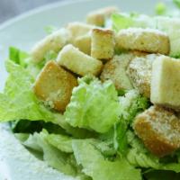Caesar Salad · Romaine lettuce, Parmesan cheese, homemade dressing and croutons.