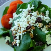 Spinach Salad · Baby spinach, tomatoes, roasted walnuts, dry cranberries, Goat cheese and balsamic vinaigret...