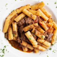Short Rib Rigatoni Pasta · Beef short rib tips braised in Chianti wine and homemade tomato sauce tossed with rigatoni p...