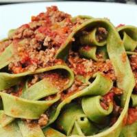 Spinach Fettuccine Bolognese Pasta · Homemade spinach fettuccine and meat sauce.