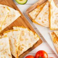 Chicken Cheesadilla® · Chicken breast and melted cheddar cheese in a grilled tortilla, served with a side of sour c...