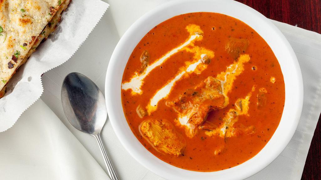 Chicken Tikka Masala · Boneless chicken cooked in thick creamy sauce with nuts.