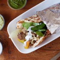 Naan Wrap · Your choice of protein wrapped in fresh baked naan