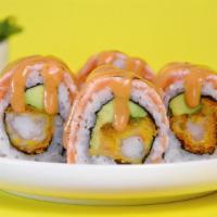 Fire Roll · Shrimp tempura and avocado, topped with seared Scottish salmon and our secret spicy sauce.
