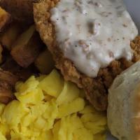 Country Fried Steak · Breaded Country Fried Steak topped with  sausage gravy and 2 eggs, hash browns or homefries,...