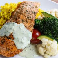 Roasted Salmon* · (Available til 11pm) Fresh hand-cut Atlantic salmon, rice pilaf, roasted vegetables, Cilantr...