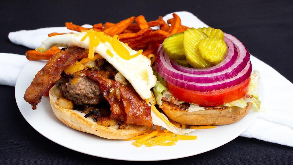 Wake N Bake · Fried egg, home fries, cheddar, bacon and your choice of burger.