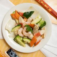 Seafood Delight · Lobster, shrimp, scallop and crab meat sauteed with vegetable in white sauce.