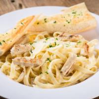 Fettuccini Alfredo · Flat noodles and cream sauce. Add baked mozzarella cheese for an additional charge.